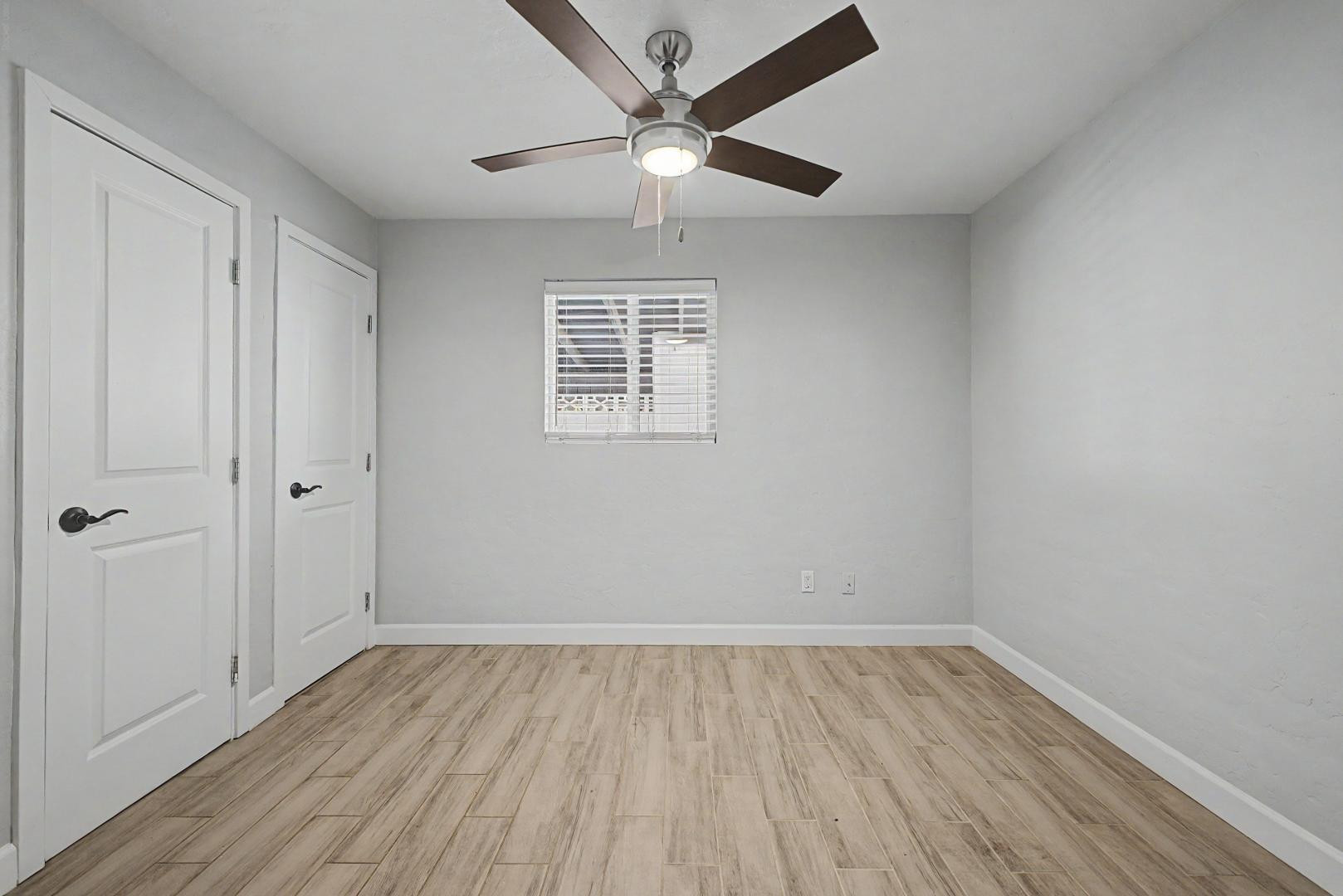 2534 North 28th Street Phoenix, AZ 85008 - Photo 20 of 33 wooden floor in an empty room with a window