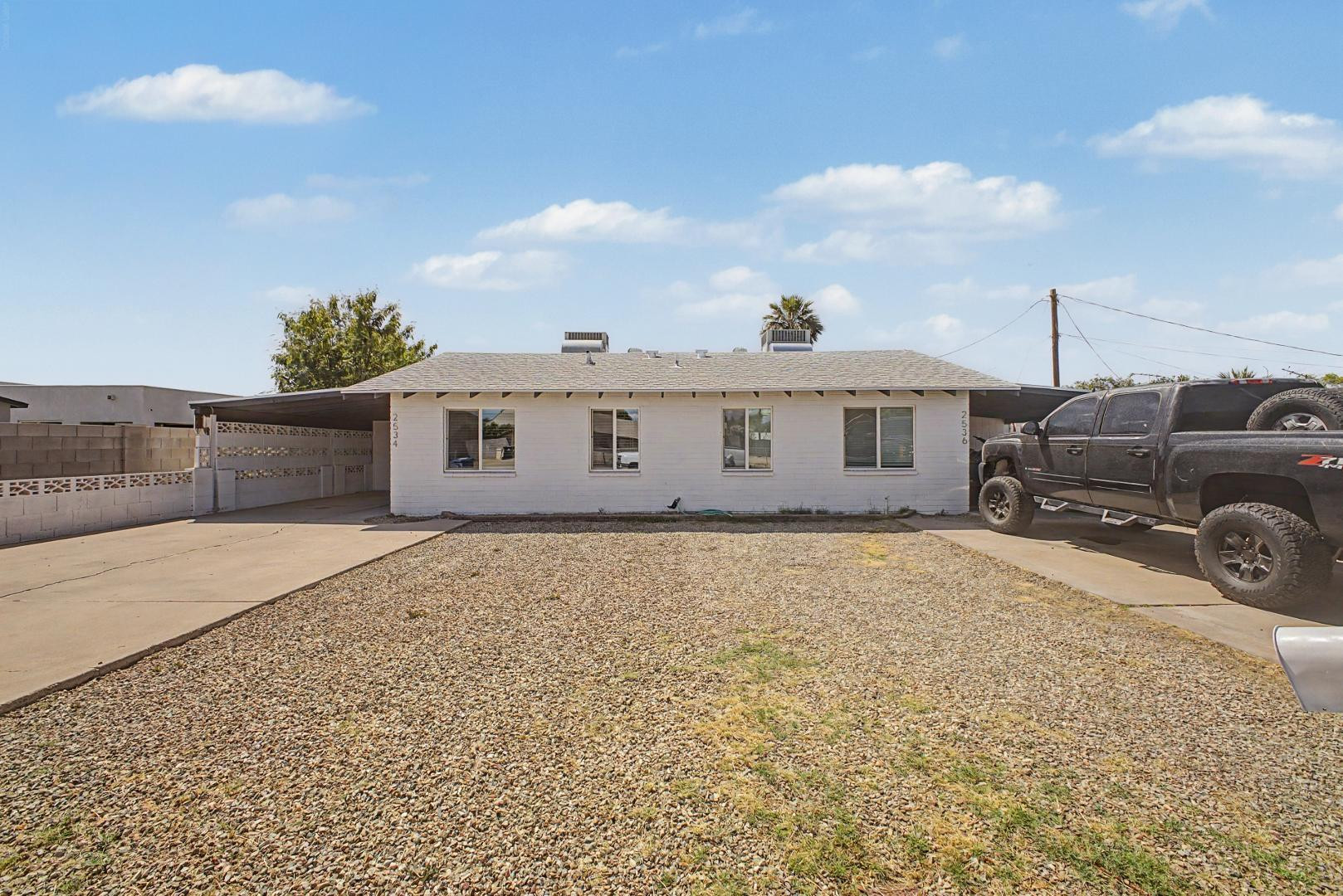 2534 North 28th Street Phoenix, AZ 85008 - Photo 4 of 33 a view of a house with a backyard