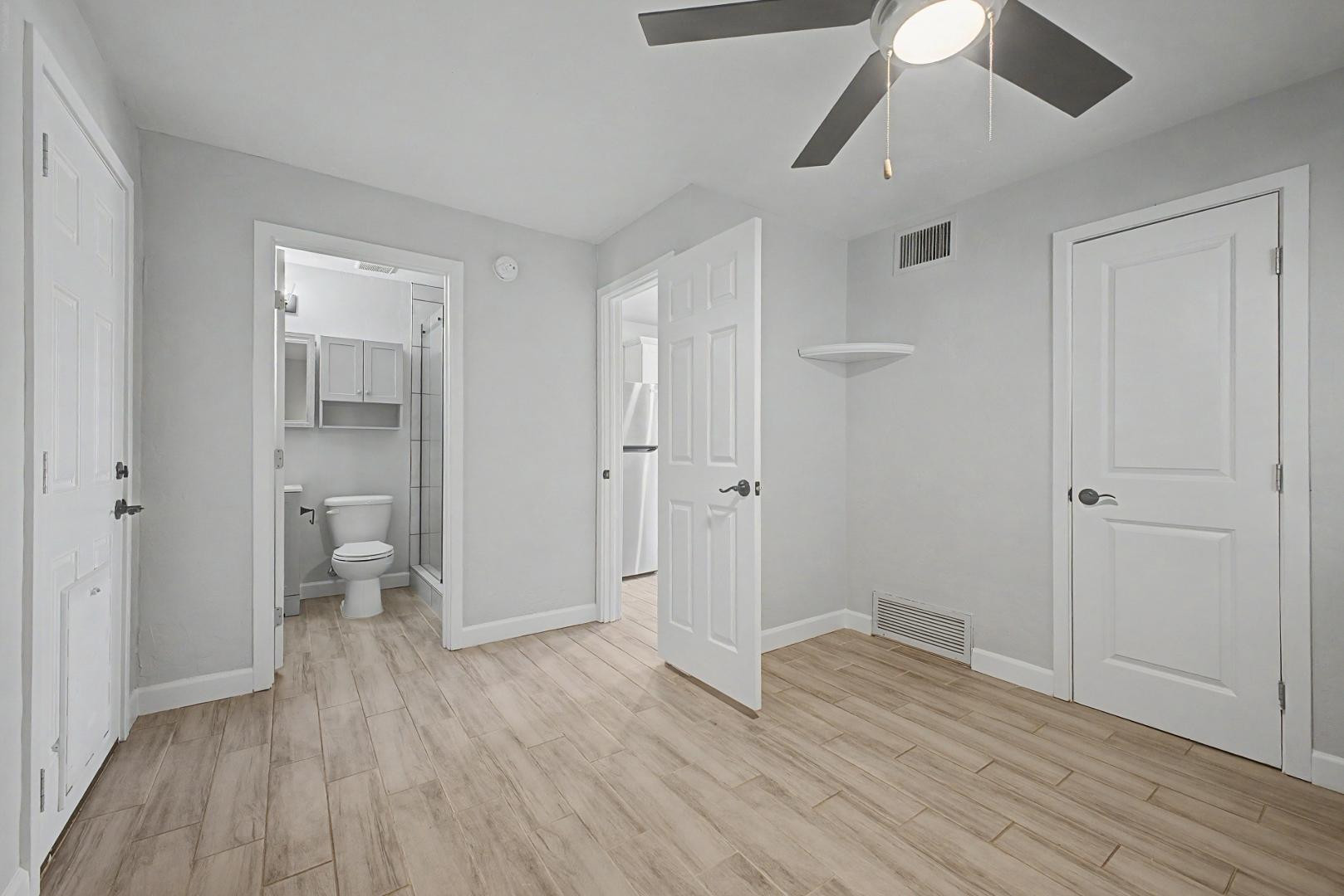 2534 North 28th Street Phoenix, AZ 85008 - Photo 8 of 33 a view of an empty room and wooden floor