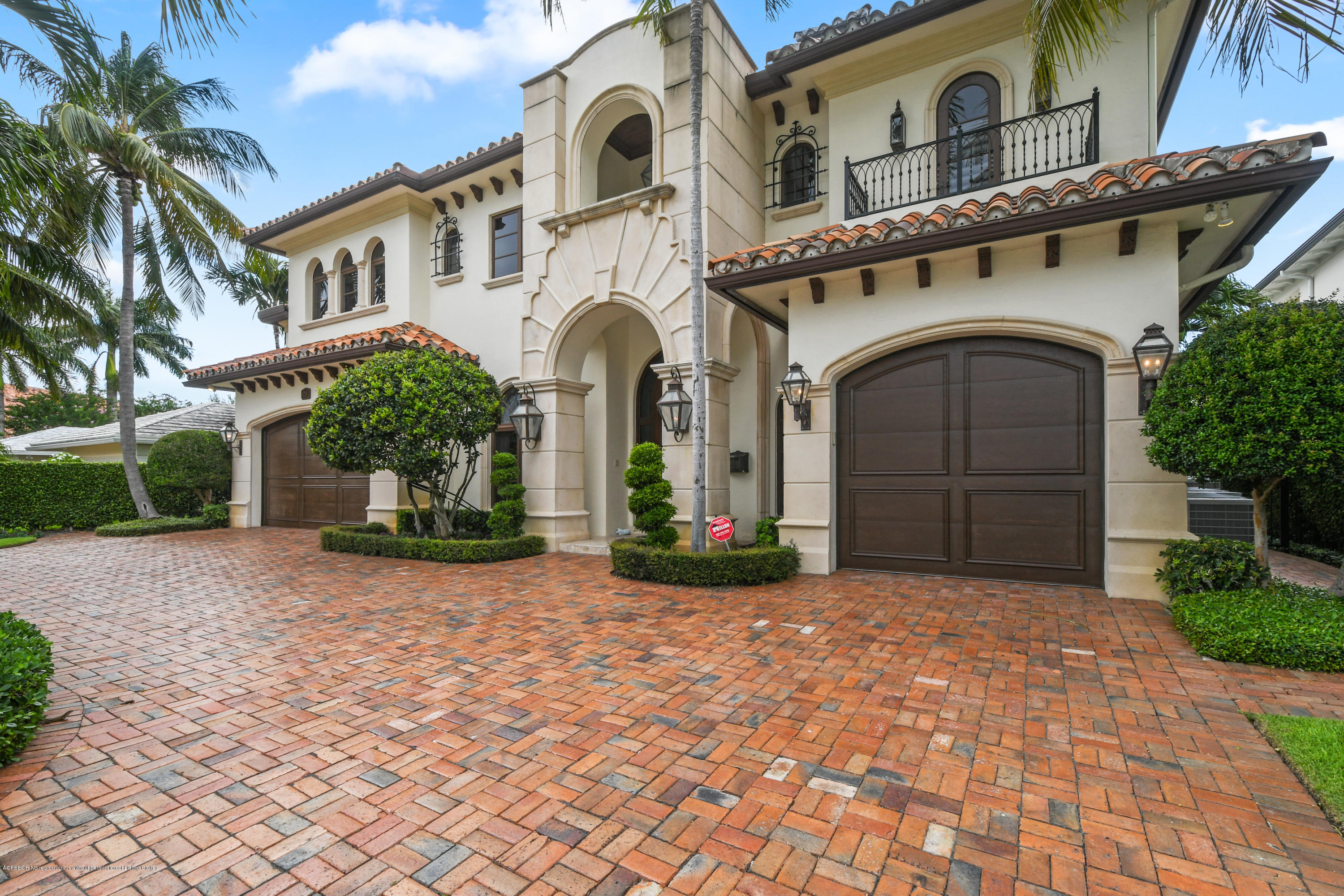 777 Northeast 35th Street Boca Raton, FL 33431 - Photo 2 of 50 a view of a grey house with large windows