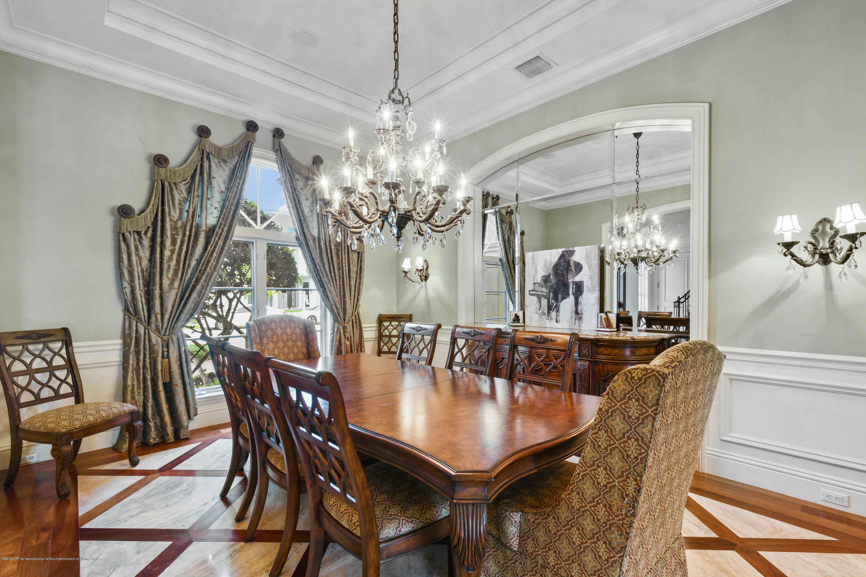 777 Northeast 35th Street Boca Raton, FL 33431 - Photo 12 of 50 a view of a dining room with furniture and chandelier