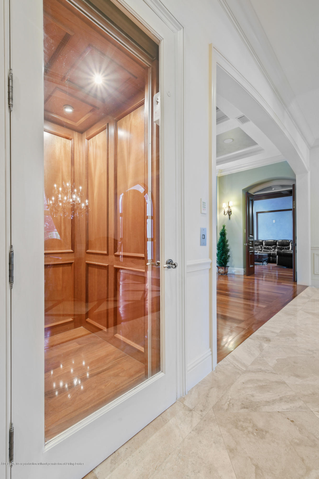 777 Northeast 35th Street Boca Raton, FL 33431 - Photo 13 of 50 a view of a hallway with wooden floor and a living room