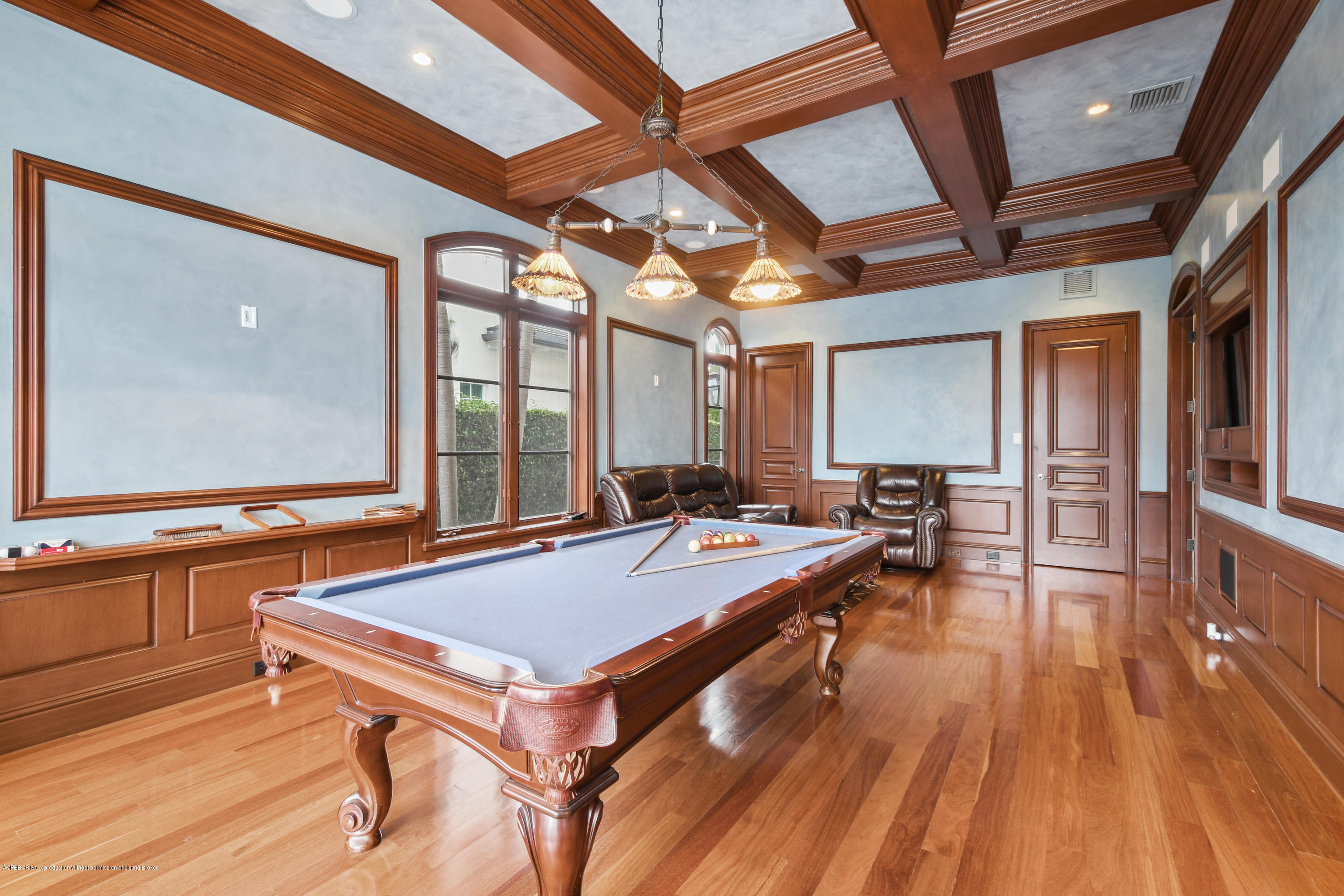 777 Northeast 35th Street Boca Raton, FL 33431 - Photo 15 of 50 a room with gym equipment and wooden floor