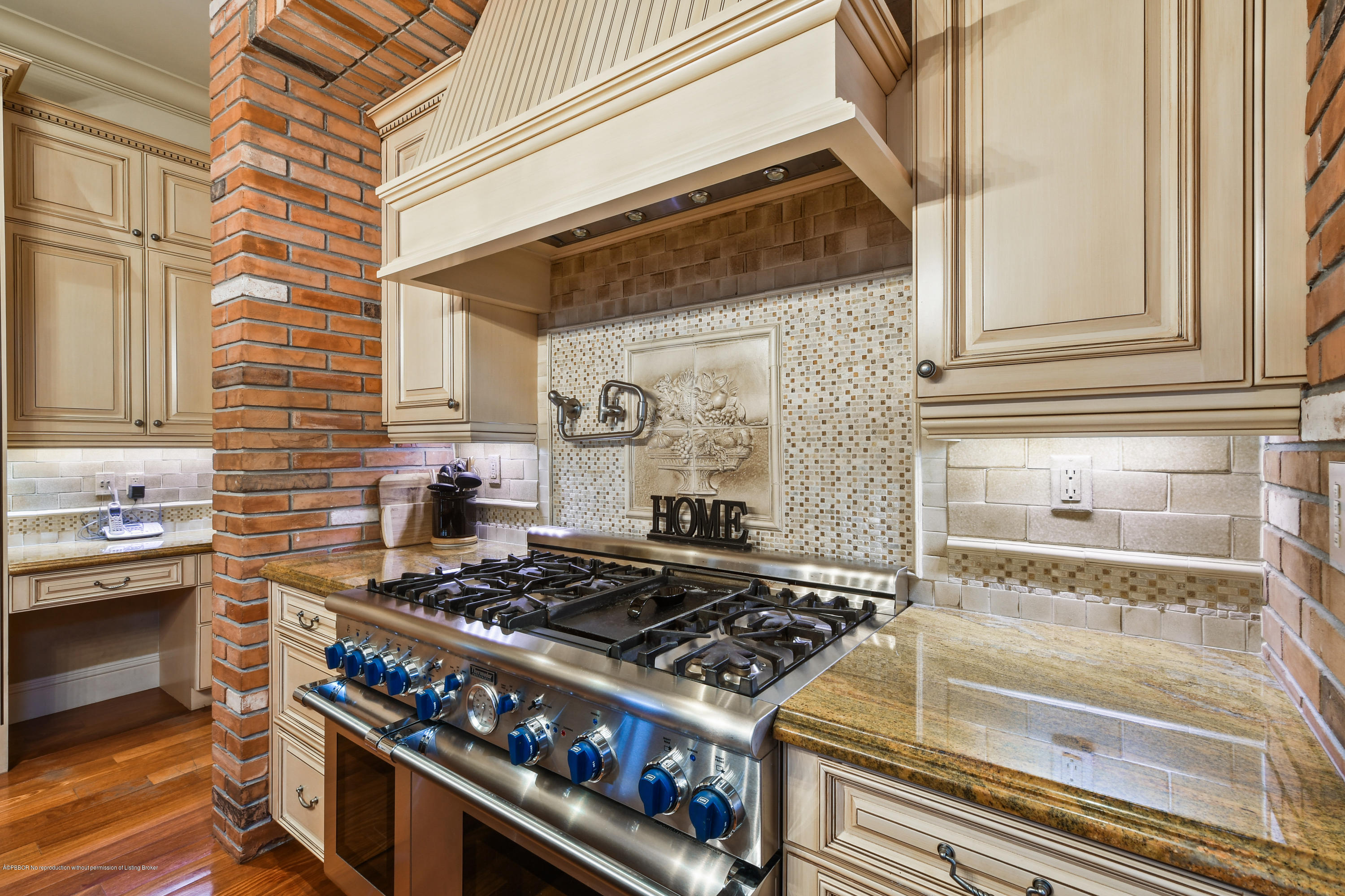 777 Northeast 35th Street Boca Raton, FL 33431 - Photo 23 of 50 a kitchen with a stove and a cabinet