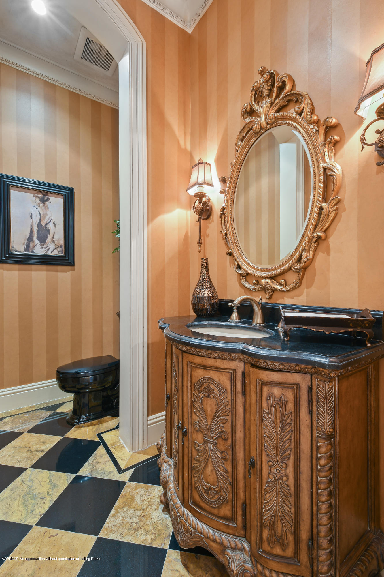 777 Northeast 35th Street Boca Raton, FL 33431 - Photo 25 of 50 a bathroom with a toilet a sink and mirror