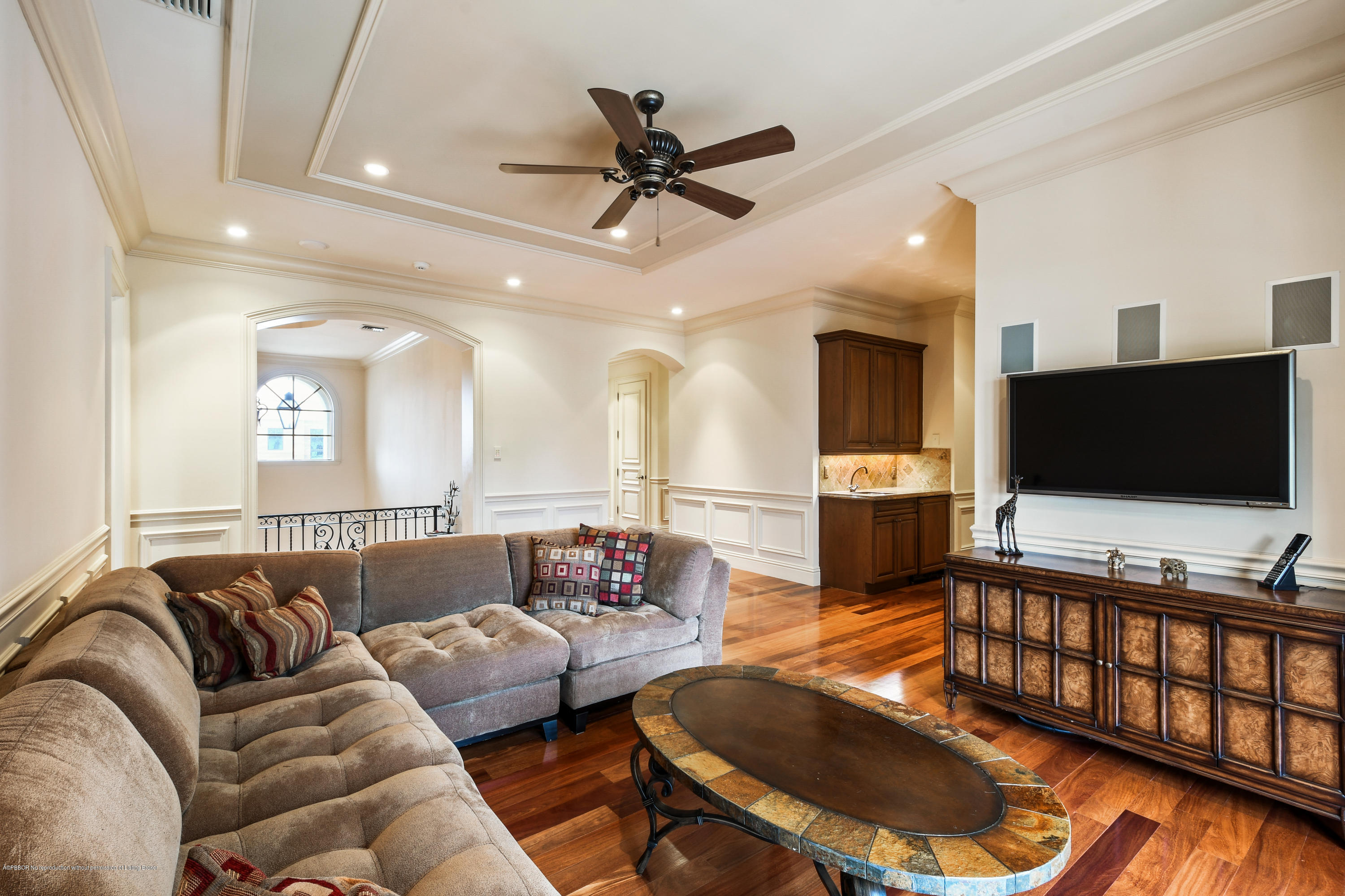 777 Northeast 35th Street Boca Raton, FL 33431 - Photo 26 of 50 a living room with furniture and a flat screen tv