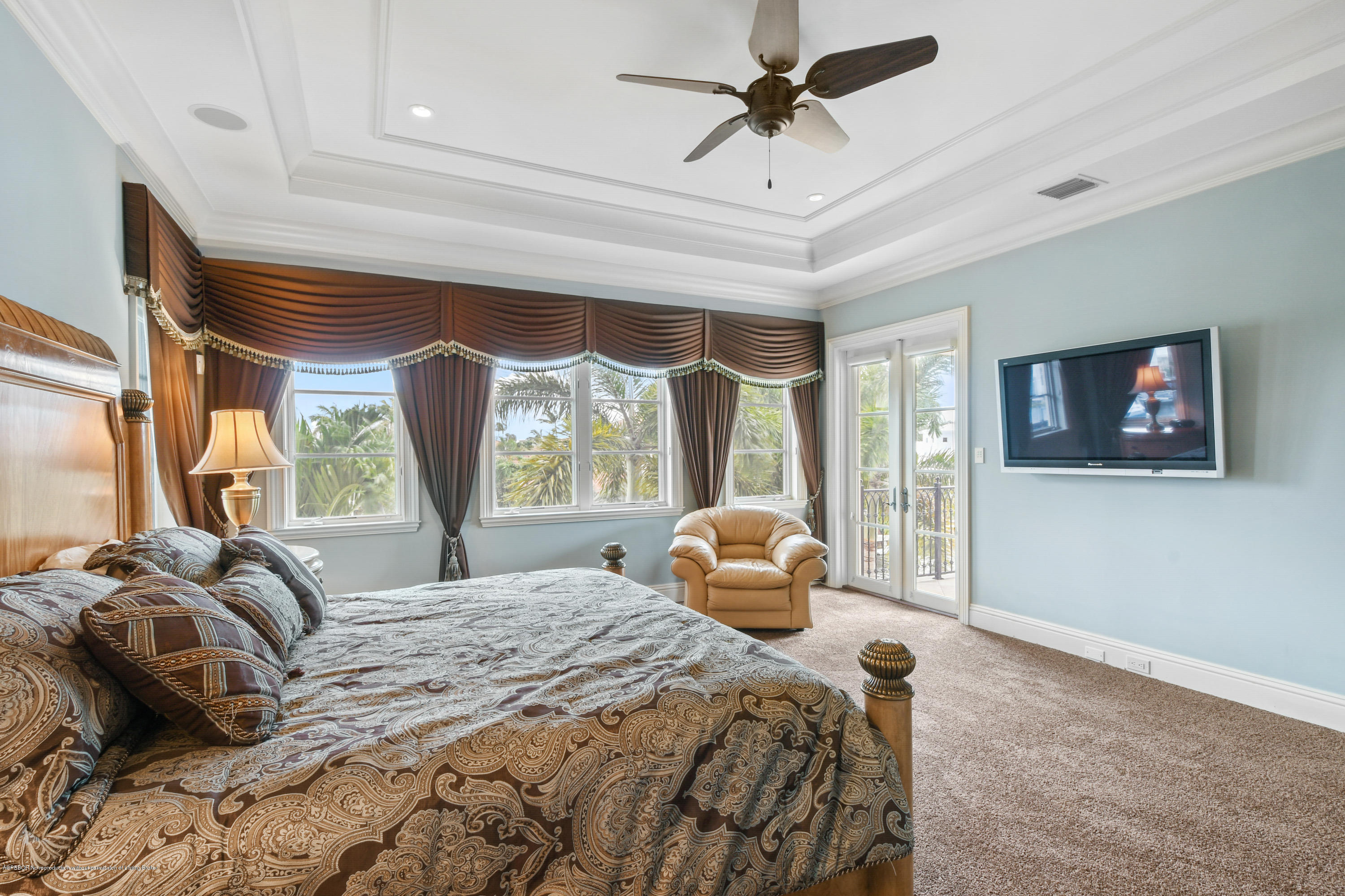 777 Northeast 35th Street Boca Raton, FL 33431 - Photo 29 of 50 a bedroom with a bed large window with couch and large mirror