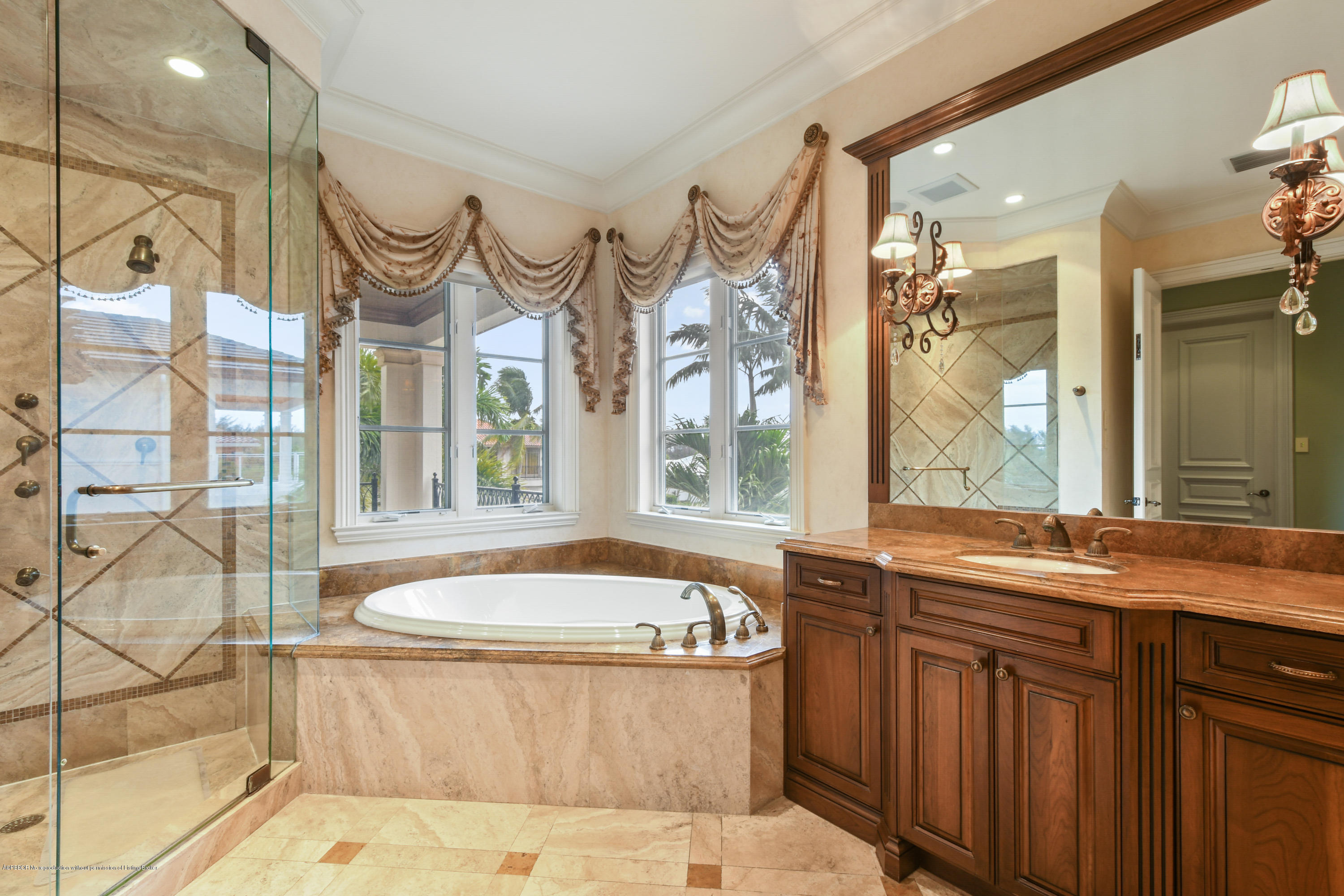 777 Northeast 35th Street Boca Raton, FL 33431 - Photo 30 of 50 a bath tub sitting next to a bathroom sink