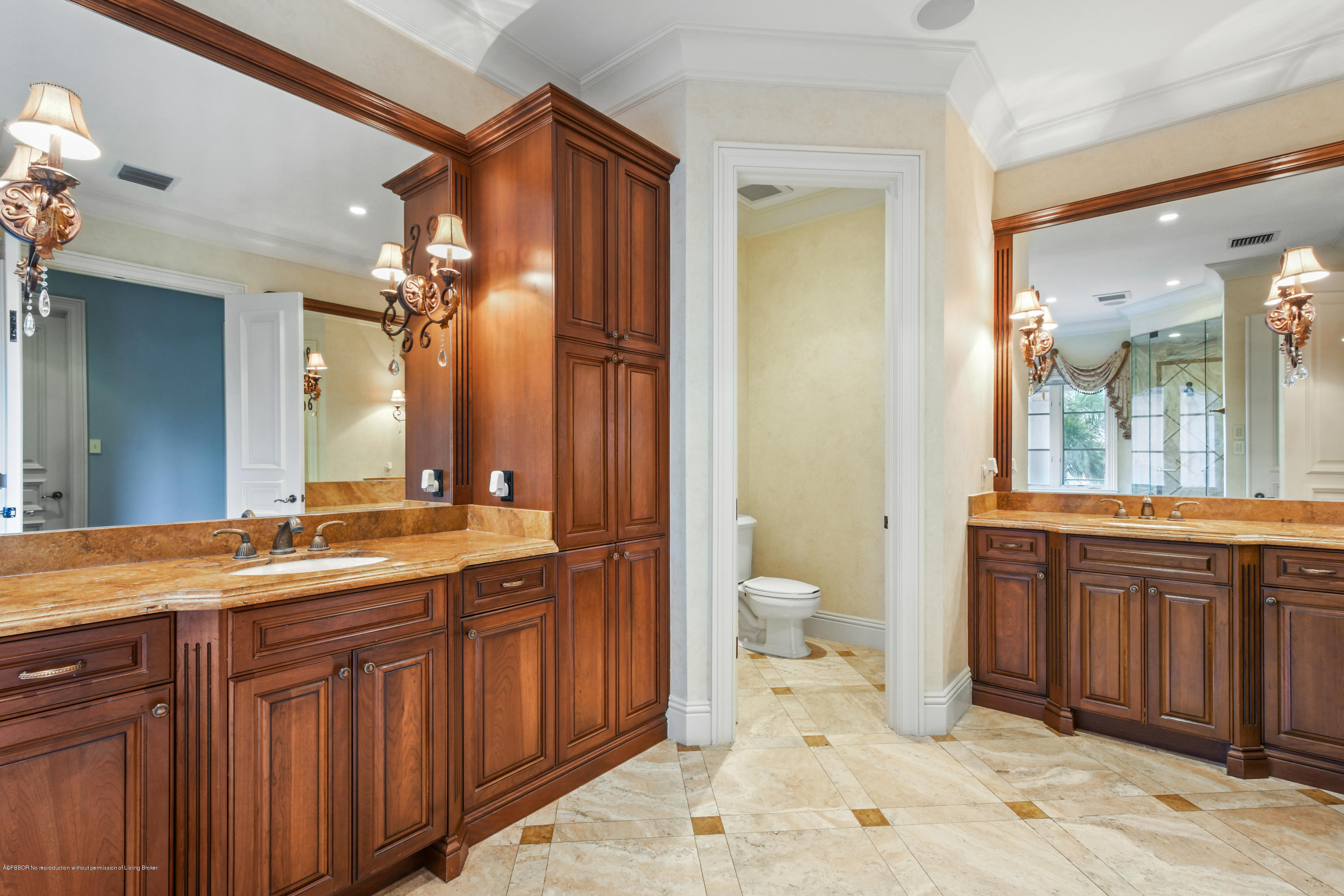 777 Northeast 35th Street Boca Raton, FL 33431 - Photo 31 of 50 a spacious bathroom with a granite countertop sink toilet mirror and a bathtub