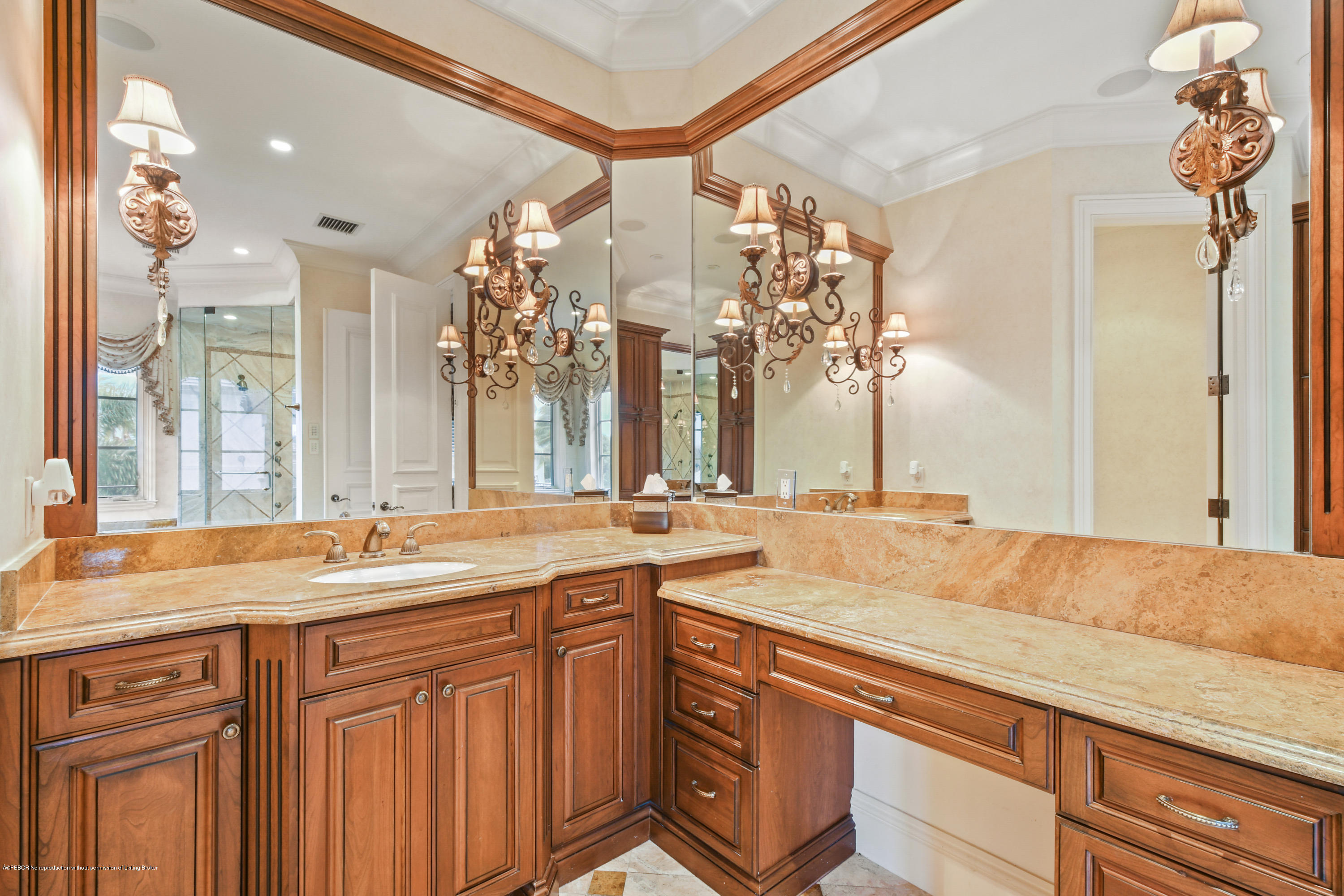 777 Northeast 35th Street Boca Raton, FL 33431 - Photo 32 of 50 a bathroom with a granite countertop sink and a mirror