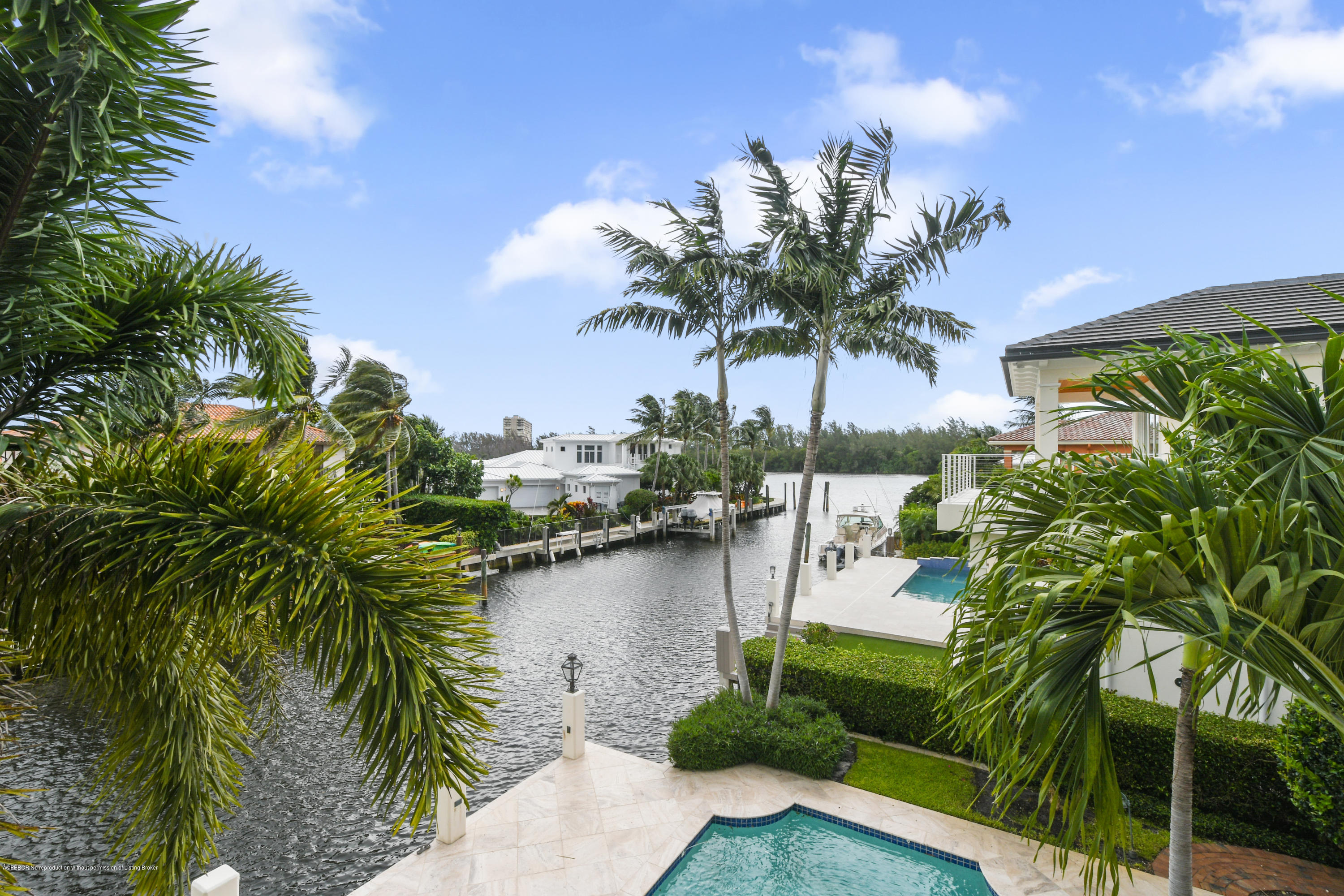 777 Northeast 35th Street Boca Raton, FL 33431 - Photo 35 of 50 a view of a lake with a palm tree
