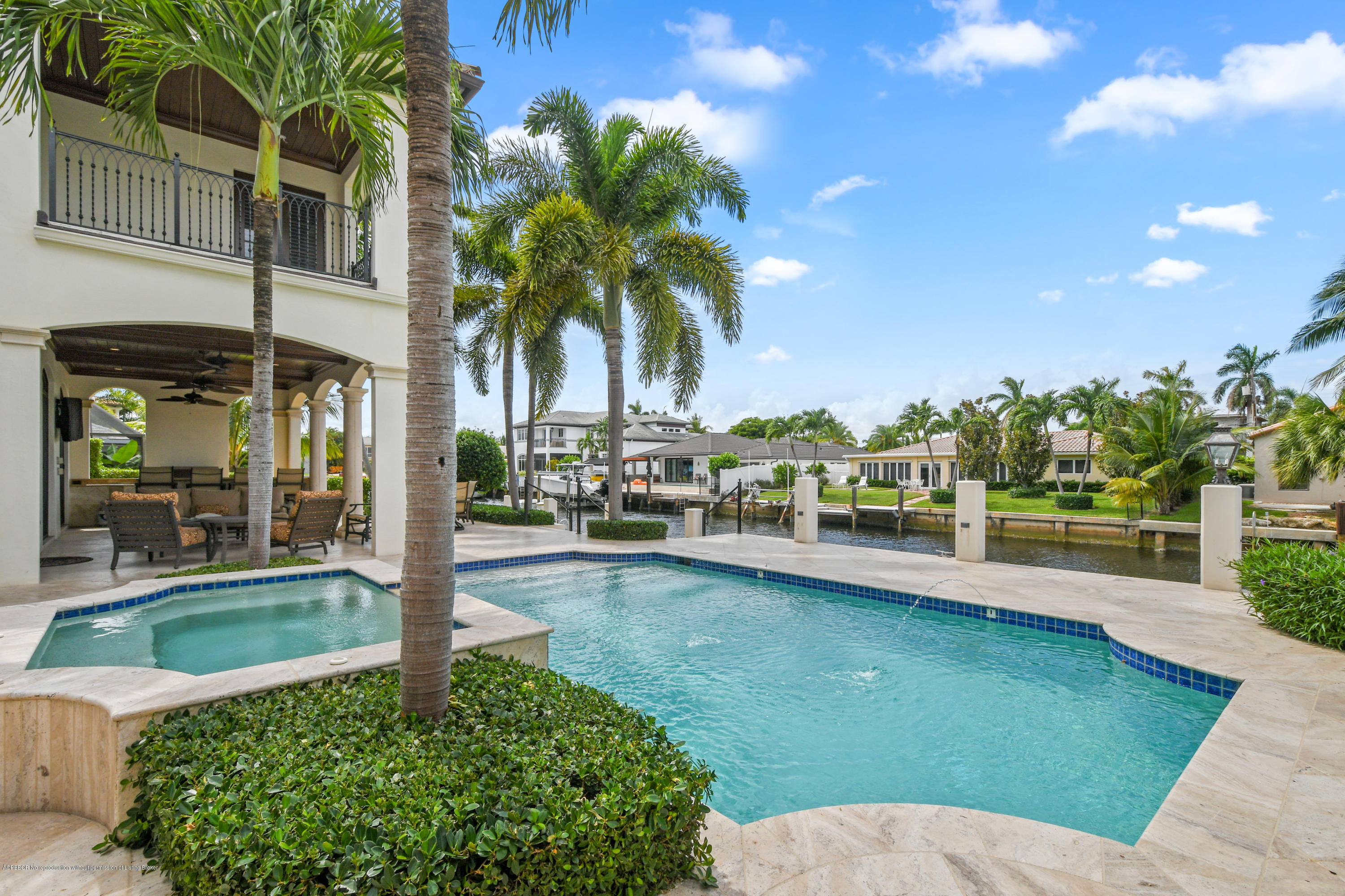 777 Northeast 35th Street Boca Raton, FL 33431 - Photo 45 of 50 a swimming pool with outdoor seating and yard