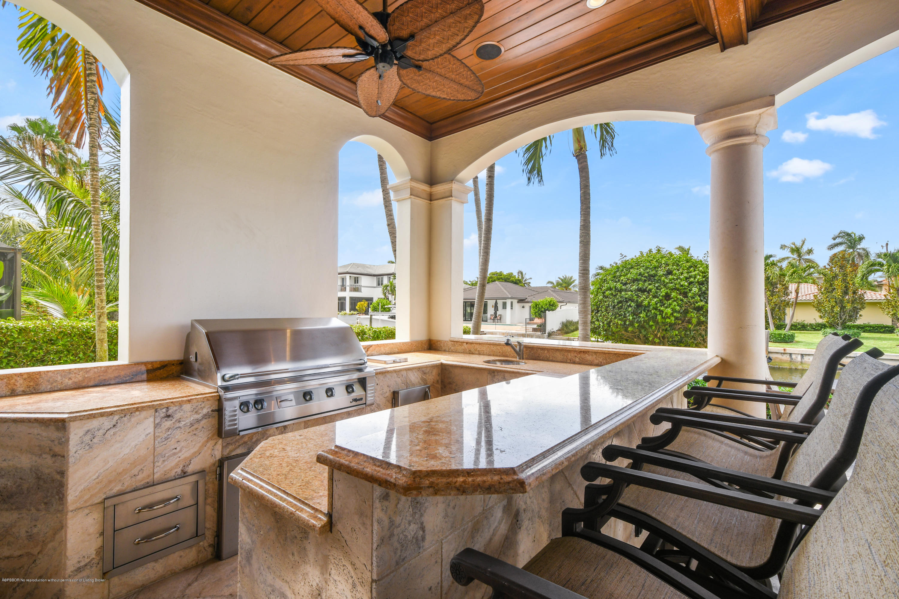 777 Northeast 35th Street Boca Raton, FL 33431 - Photo 47 of 50 a room with wooden floor pool table and chairs