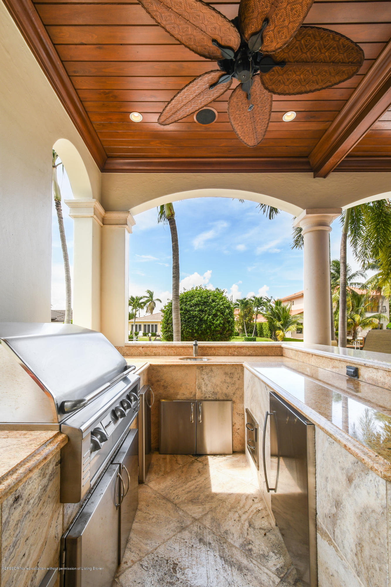 777 Northeast 35th Street Boca Raton, FL 33431 - Photo 49 of 50 a view of a kitchen with a stove and a microwave