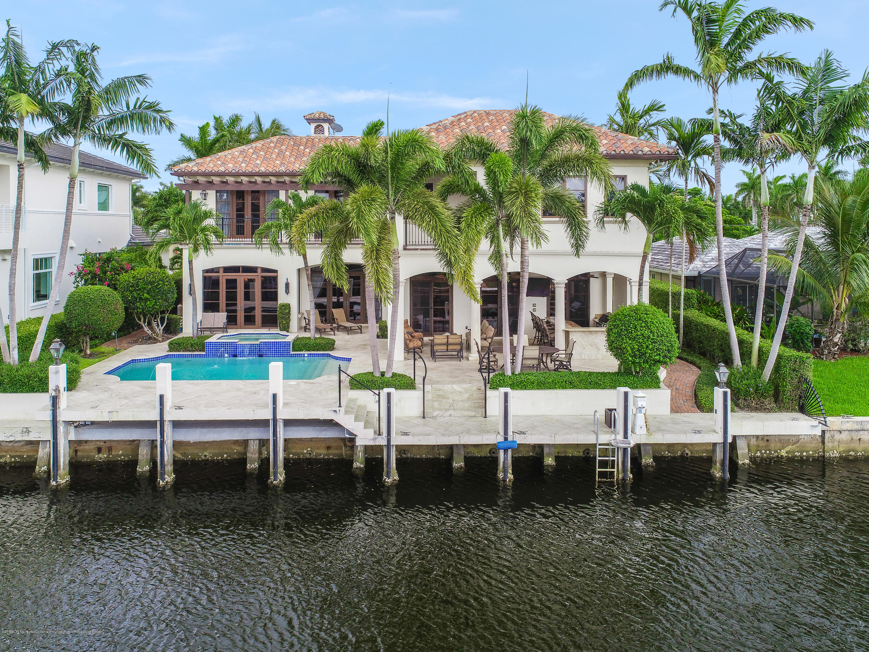 777 Northeast 35th Street Boca Raton, FL 33431 - Photo 6 of 50 a view of a house with a yard and potted plants