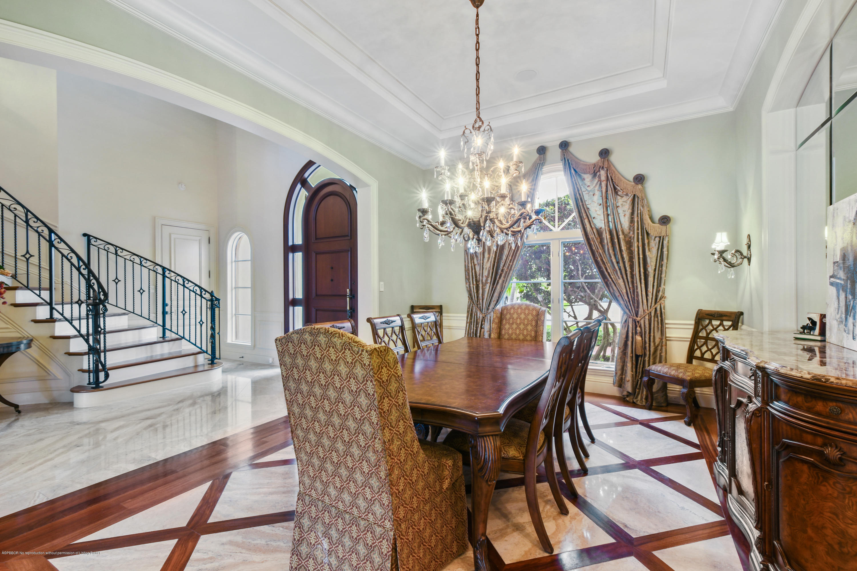 777 Northeast 35th Street Boca Raton, FL 33431 - Photo 10 of 50 a dining room with furniture a chandelier and wooden floor