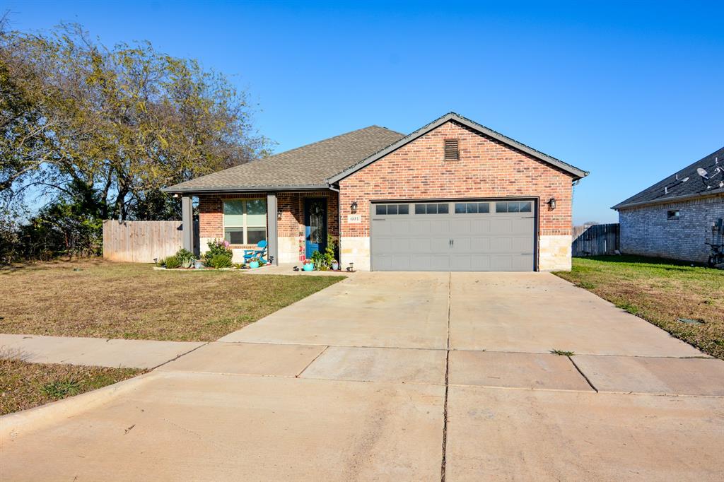 a view of outdoor space and front view of a house