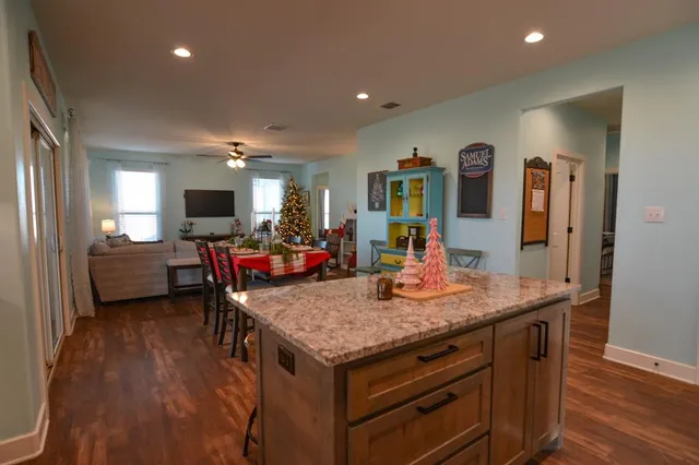 a room with furniture and wooden floor