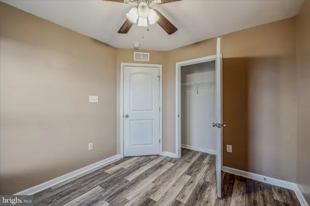 a view of a livingroom with a hardwood floor