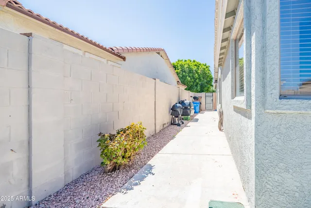 a view of a entryway with flower pots