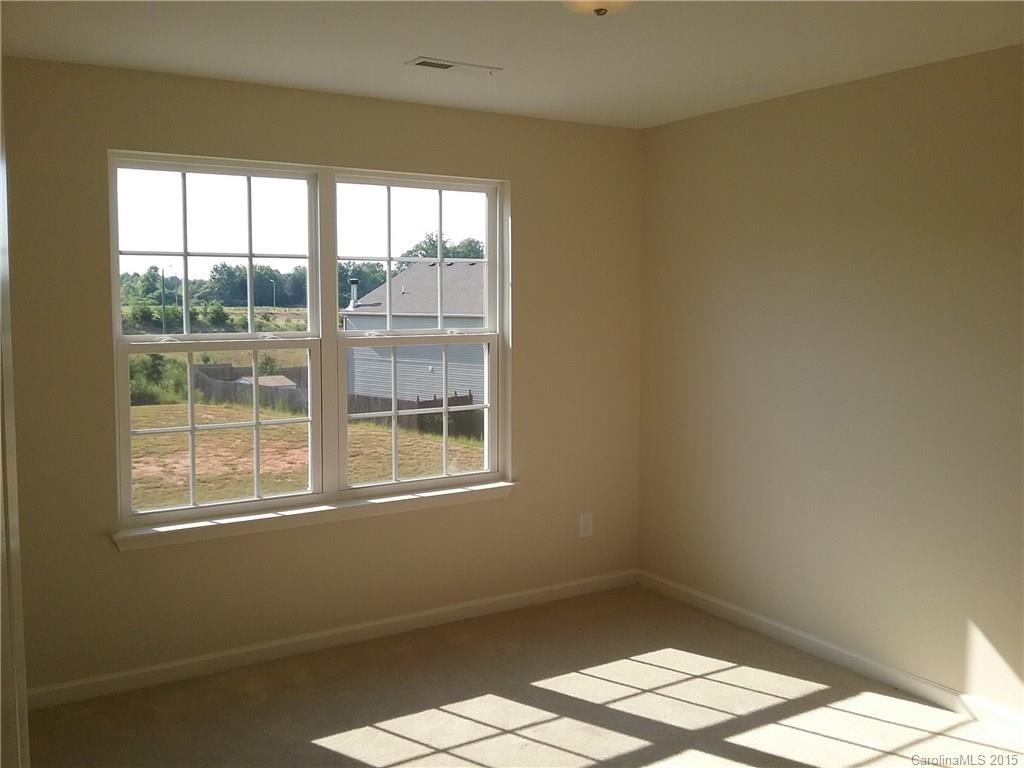 2036 Gunnars Ridge Road, Unit 28 Lancaster, SC 29720 - Photo 6 of 9 an empty room with a window