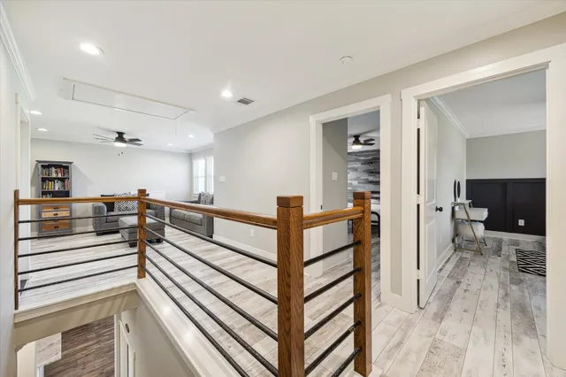 a view of walk in closet with clothes