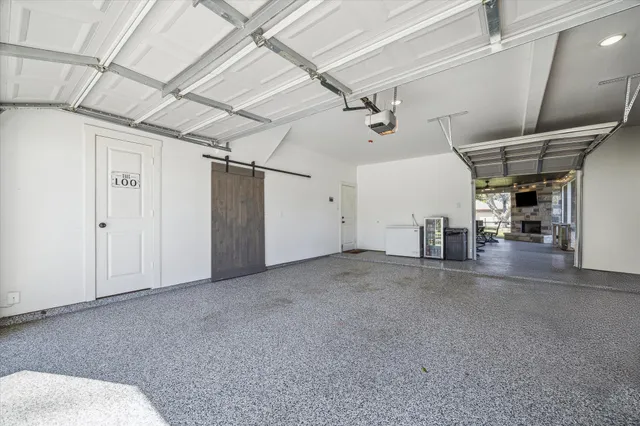 a room with a bench and wooden floor