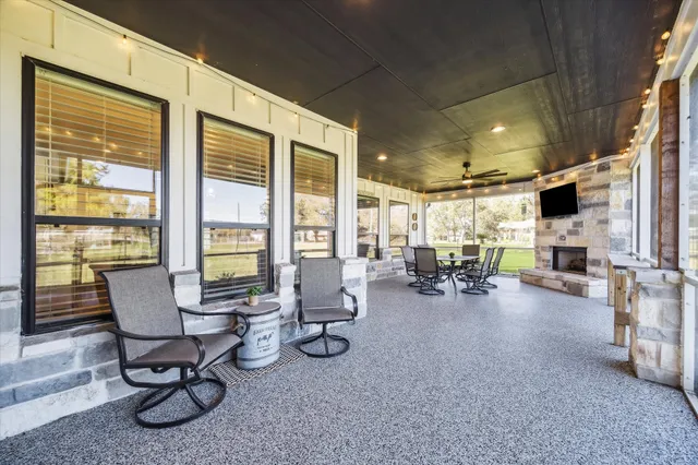 a utility room with sink dryer and washer