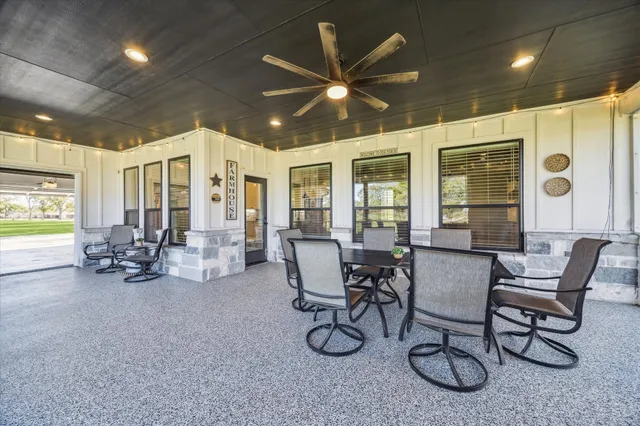a view of empty room with wooden ceiling