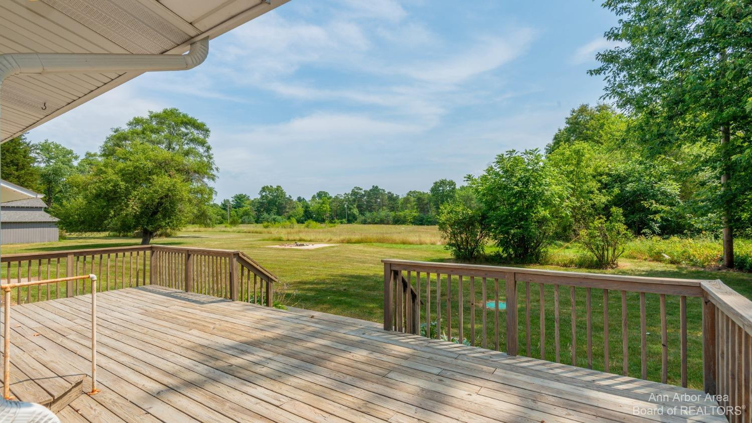 6900 Dexter-Pinckney Road Dexter, MI 48130 - Photo 25 of 30 Deck with View of Backyard