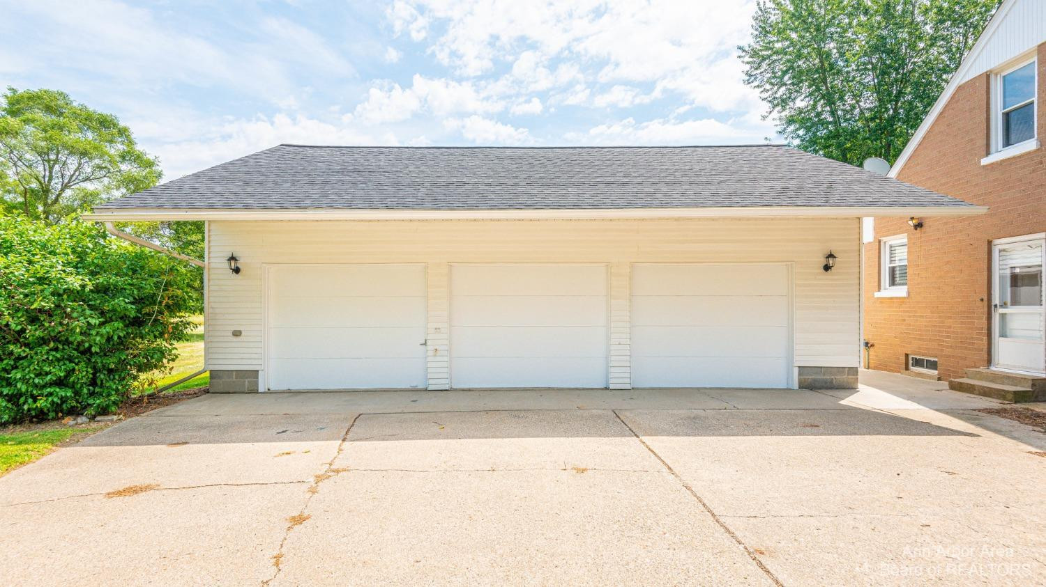 6900 Dexter-Pinckney Road Dexter, MI 48130 - Photo 3 of 30 Spacious 3 Car Detached Garage
