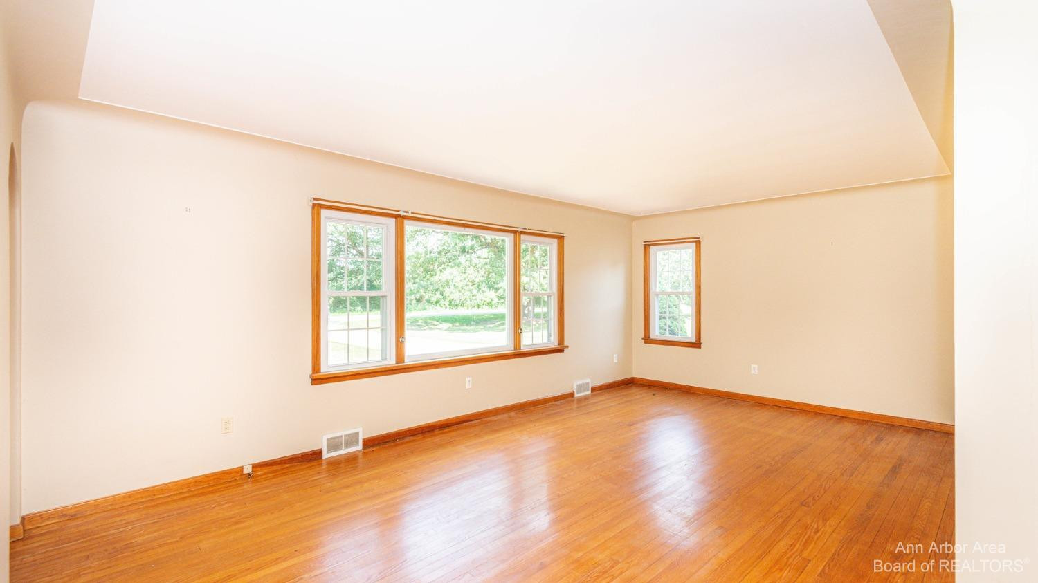 6900 Dexter-Pinckney Road Dexter, MI 48130 - Photo 5 of 30 Living Room - Hardwood Floors