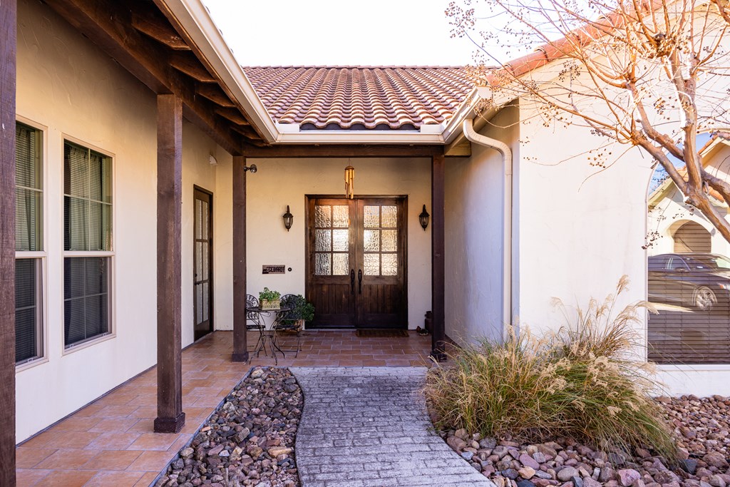 3801-12 Club House Road Kerrville, TX 78028 - Photo 2 of 23 a front view of a house with a large window