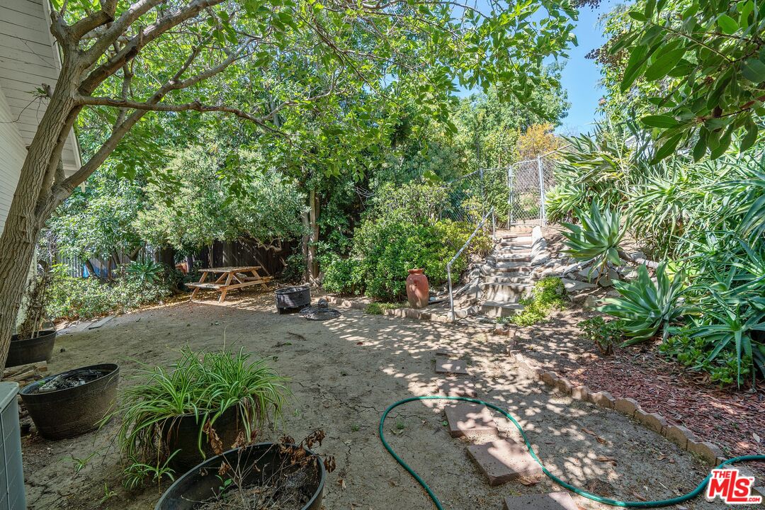 2117 Vestal Avenue Los Angeles, CA 90026 - Photo 23 of 26 a view of backyard with outdoor seating and trees