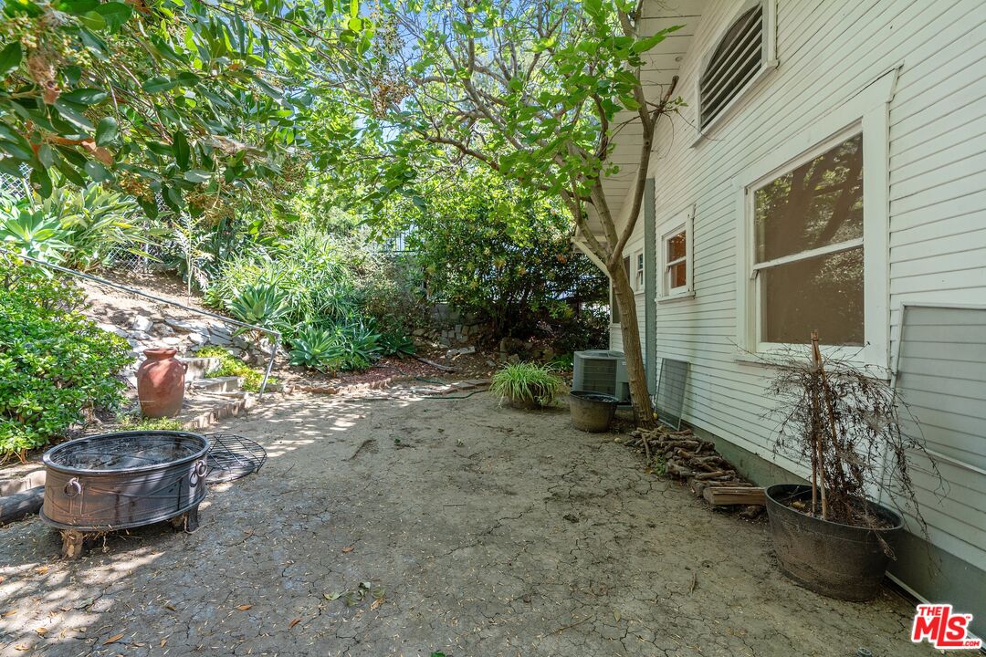 2117 Vestal Avenue Los Angeles, CA 90026 - Photo 25 of 26 a backyard of a house with outdoor seating