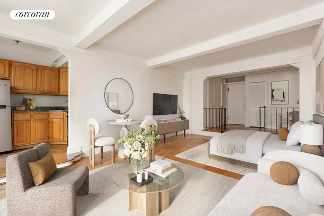 a living room with furniture a mirror and a flat screen tv