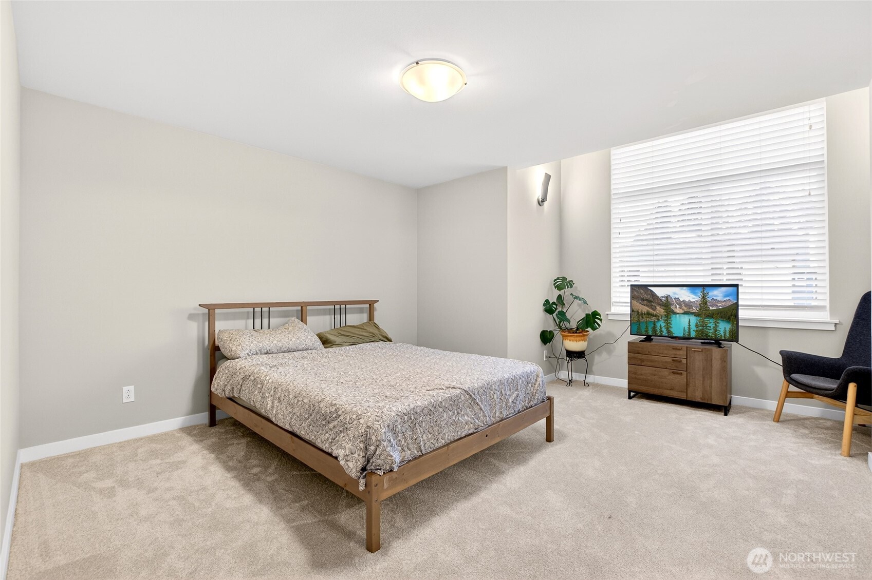 22925 79th Place West, Unit B Edmonds, WA 98026 - Photo 14 of 39 a bedroom with a bed and a couch