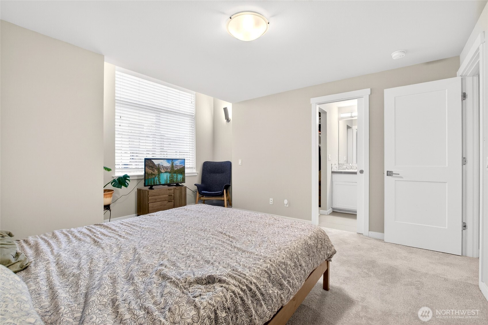 22925 79th Place West, Unit B Edmonds, WA 98026 - Photo 16 of 39 a bedroom with a bed and a closet