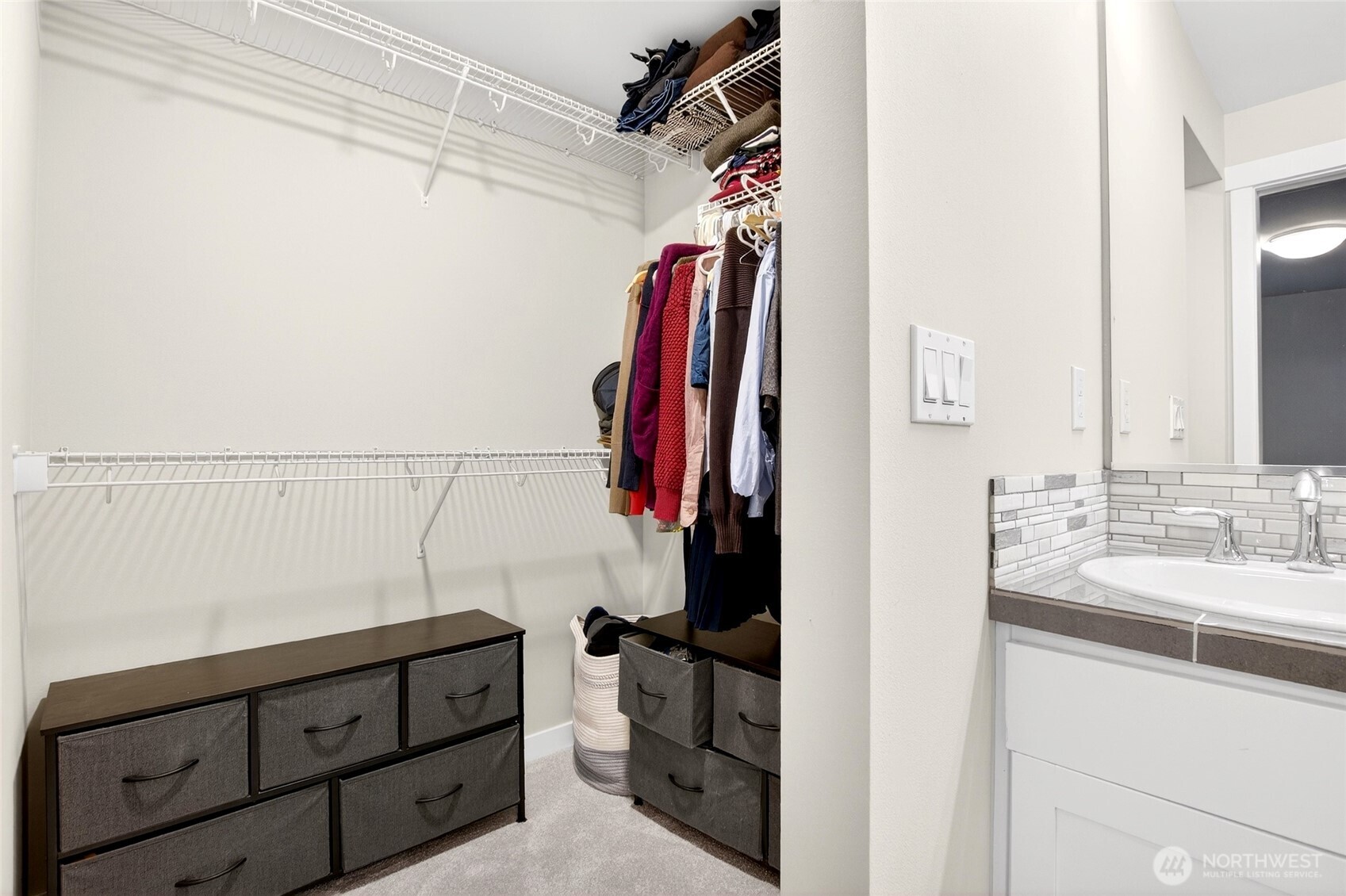 22925 79th Place West, Unit B Edmonds, WA 98026 - Photo 19 of 39 a bathroom with a sink and a mirror
