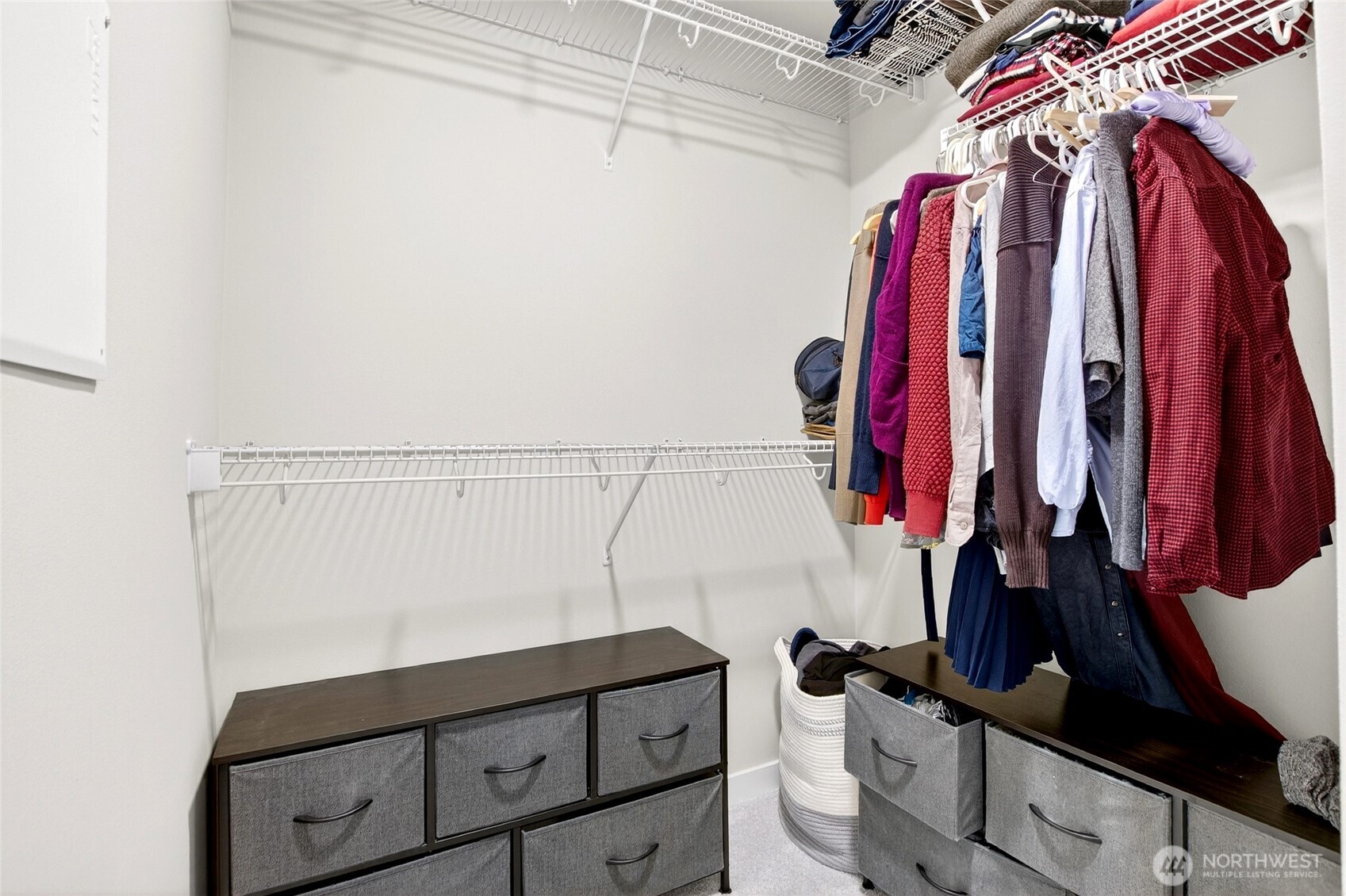 22925 79th Place West, Unit B Edmonds, WA 98026 - Photo 20 of 39 a view of walk in closet with clothes and shoes