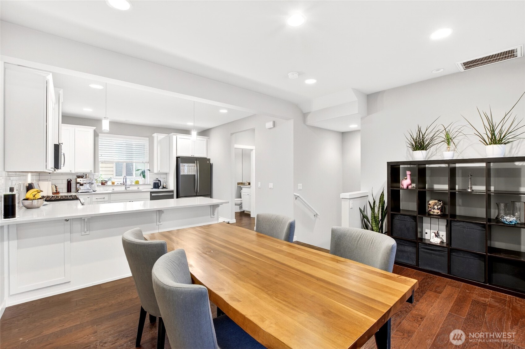 22925 79th Place West, Unit B Edmonds, WA 98026 - Photo 22 of 39 a large kitchen with a table and chairs in it