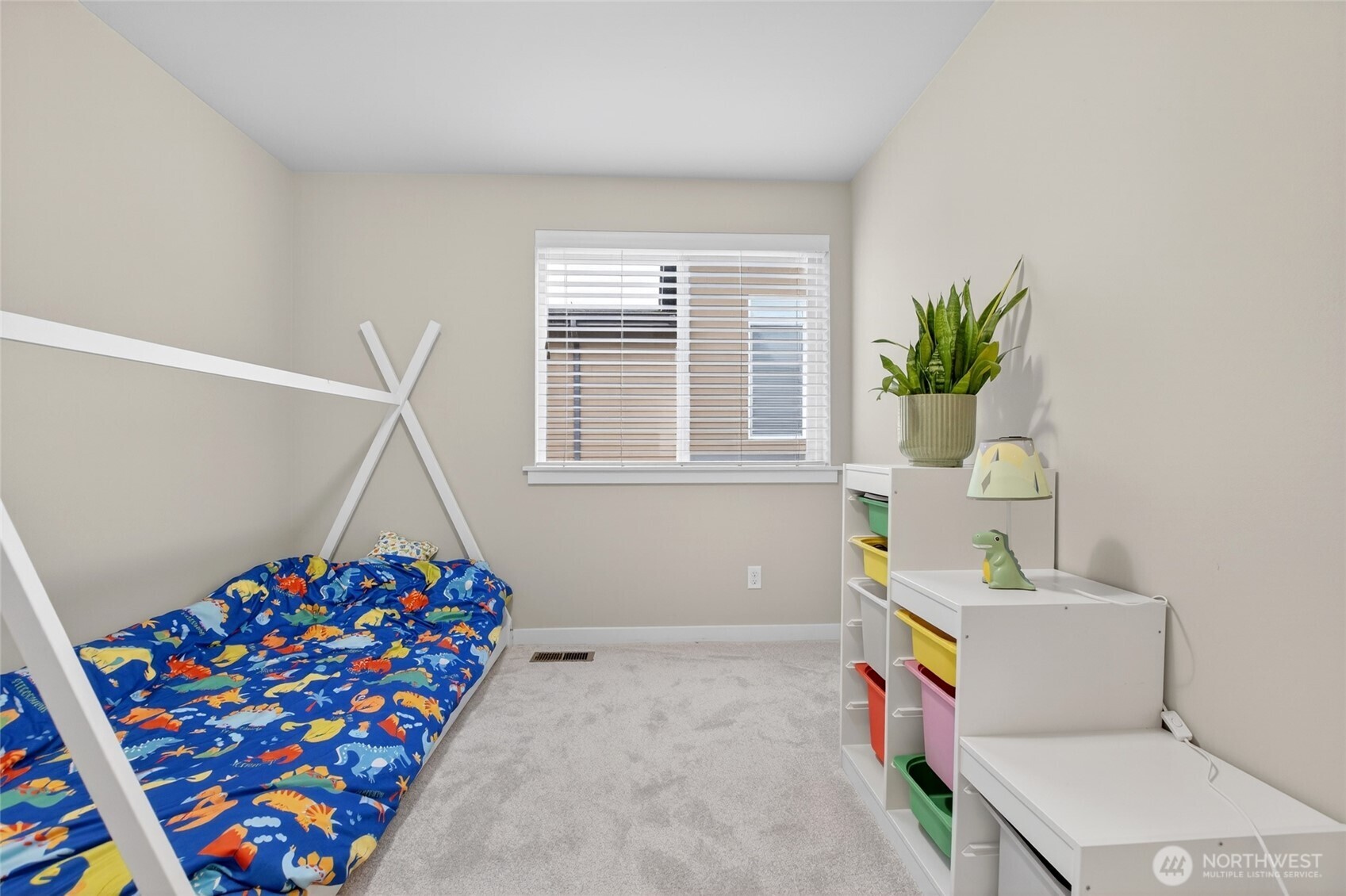 22925 79th Place West, Unit B Edmonds, WA 98026 - Photo 26 of 39 a living room with furniture and a baby crib