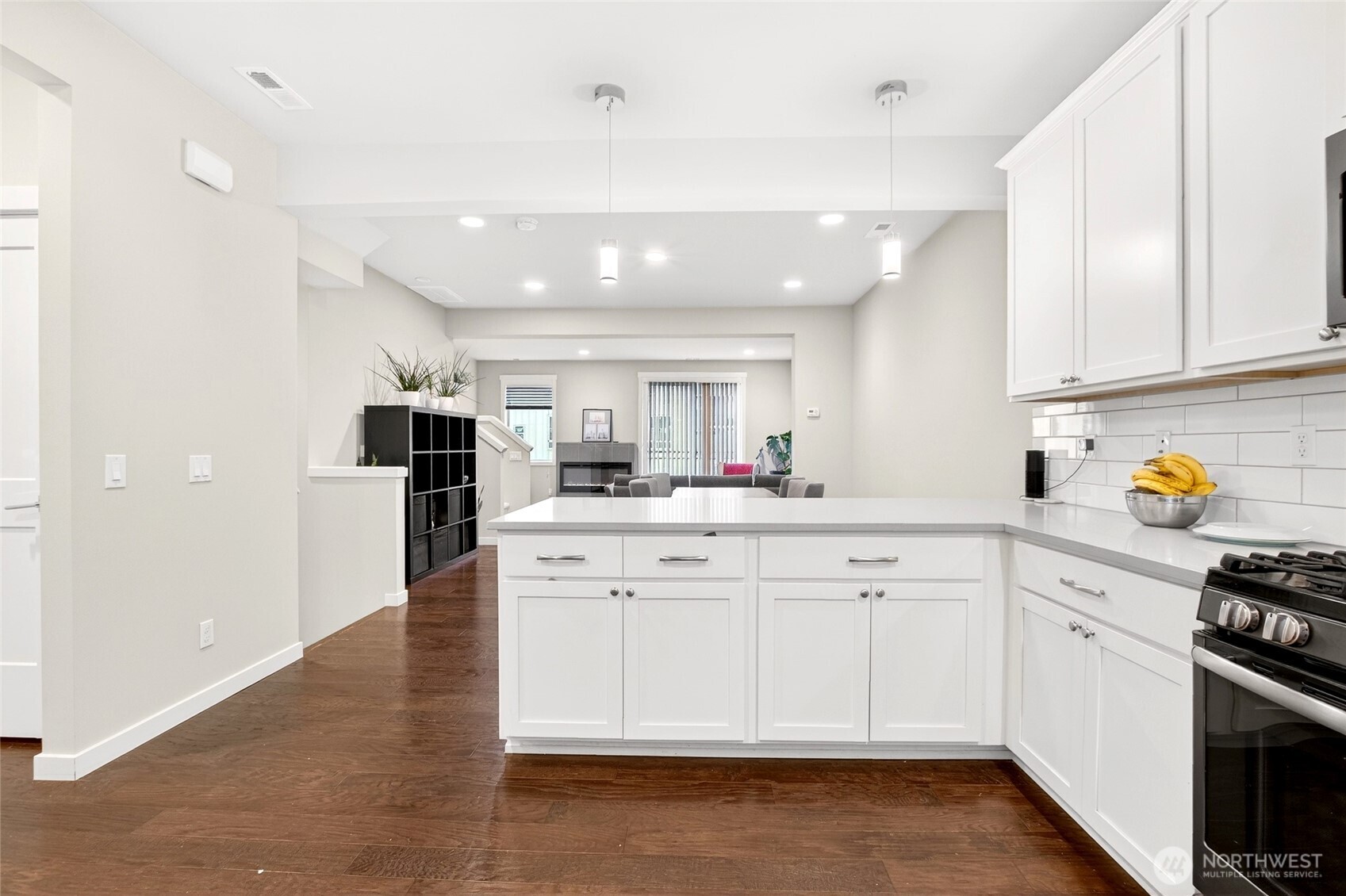22925 79th Place West, Unit B Edmonds, WA 98026 - Photo 3 of 39 a kitchen with white cabinets and appliances