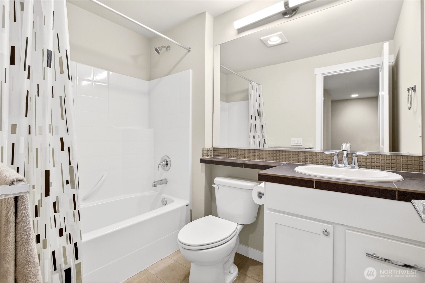 22925 79th Place West, Unit B Edmonds, WA 98026 - Photo 31 of 39 a bathroom with a sink toilet tub and shower