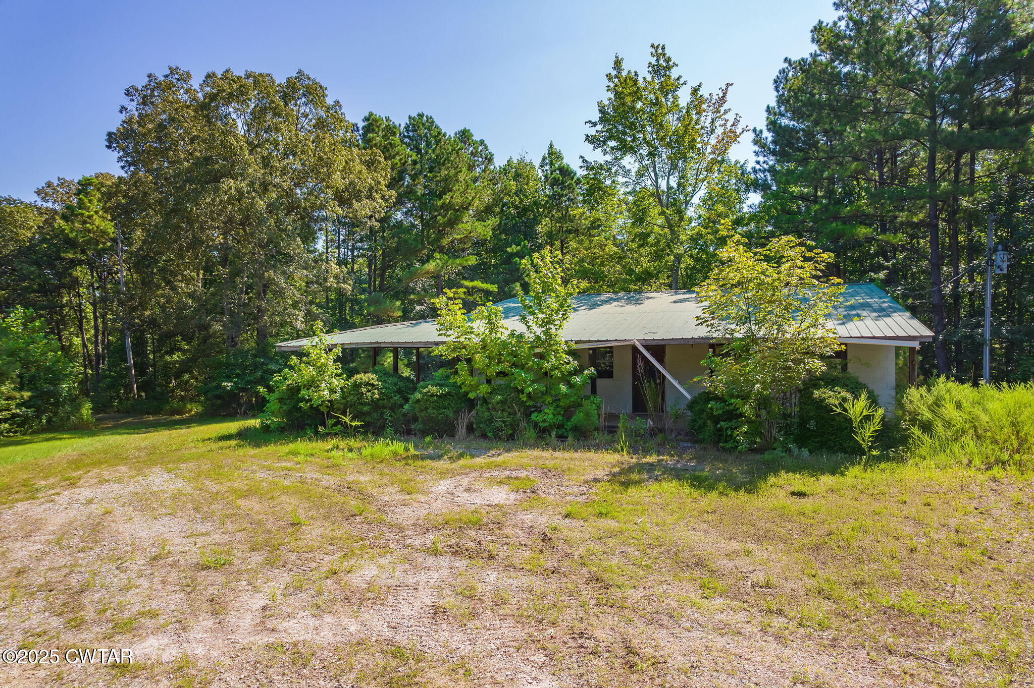 0 Leach Road Huntingdon, TN 38344 - Photo 18 of 30 a view of a house with a yard