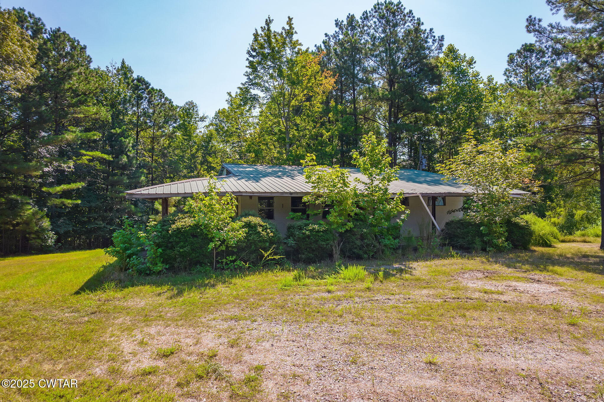 0 Leach Road Huntingdon, TN 38344 - Photo 19 of 30 a view of a house with a yard