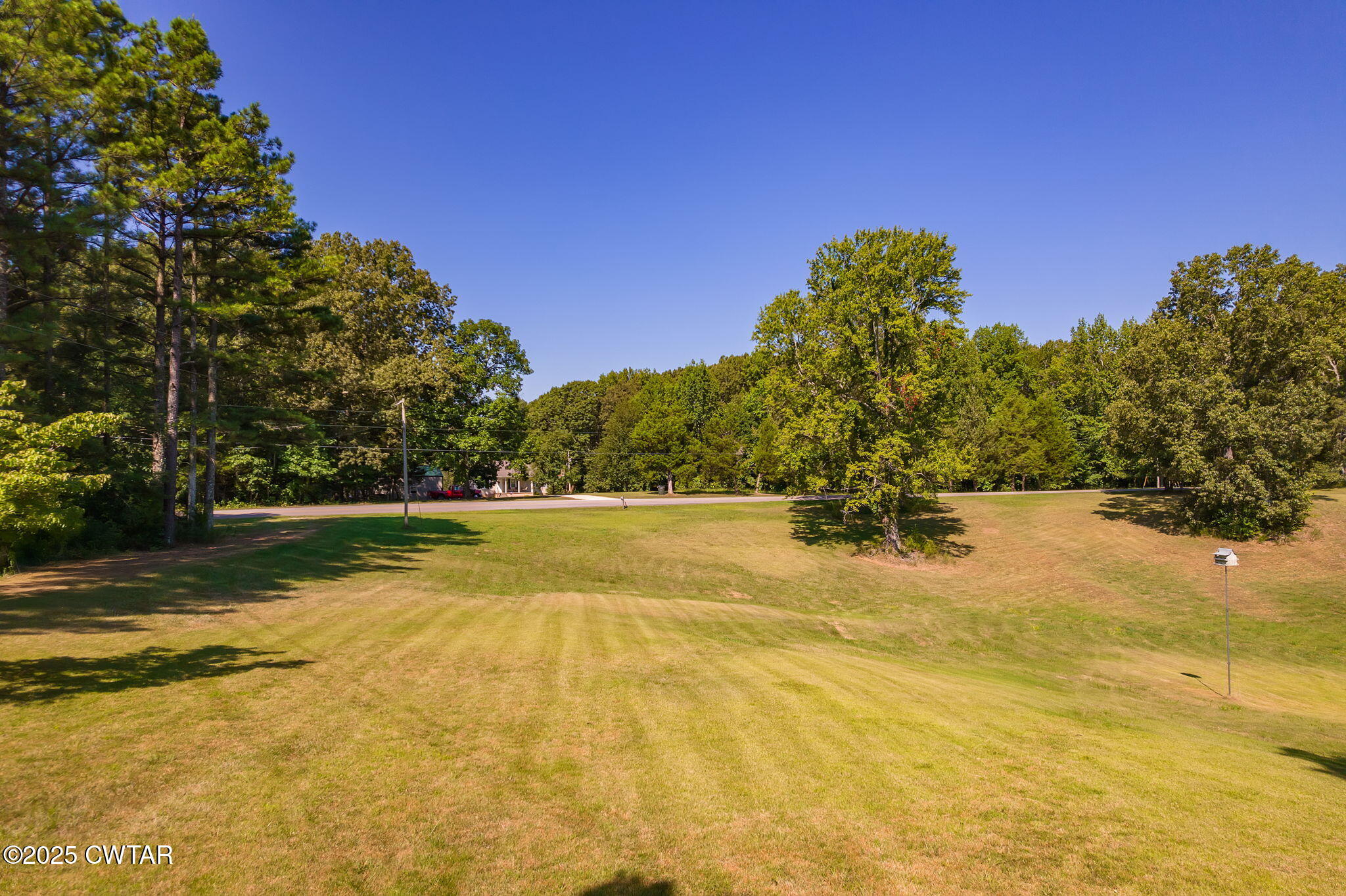 0 Leach Road Huntingdon, TN 38344 - Photo 2 of 30 a view of a yard