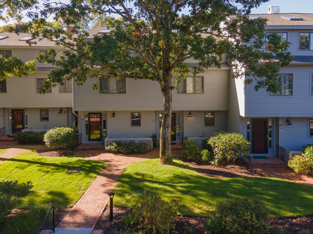 381 Great Oak Road, Unit 9 Mashpee, MA 02649 - Photo 40 of 42 a view of house with outdoor space