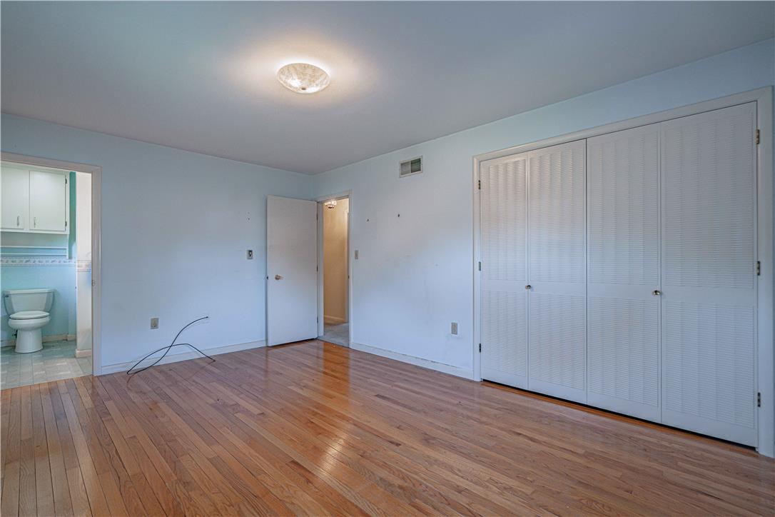 4815 Mill Road Schnecksville, PA 18078 - Photo 29 of 48 Hardwood floors and generous closet space define this comfortable, versatile bedroom.