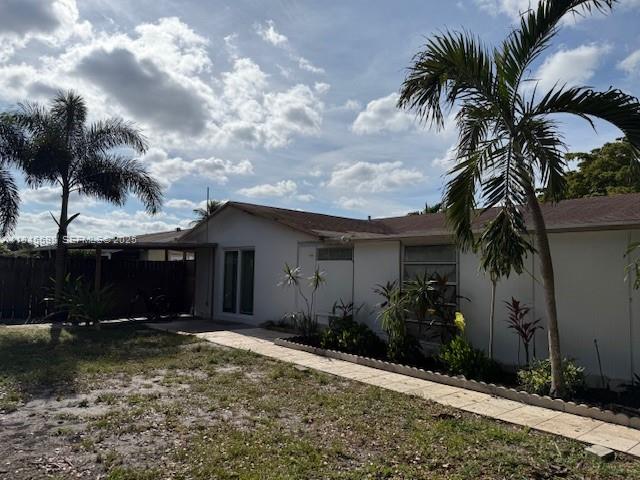 520 Southwest 62nd Avenue Margate, FL 33068 - Photo 11 of 34 a front view of house with yard and green space